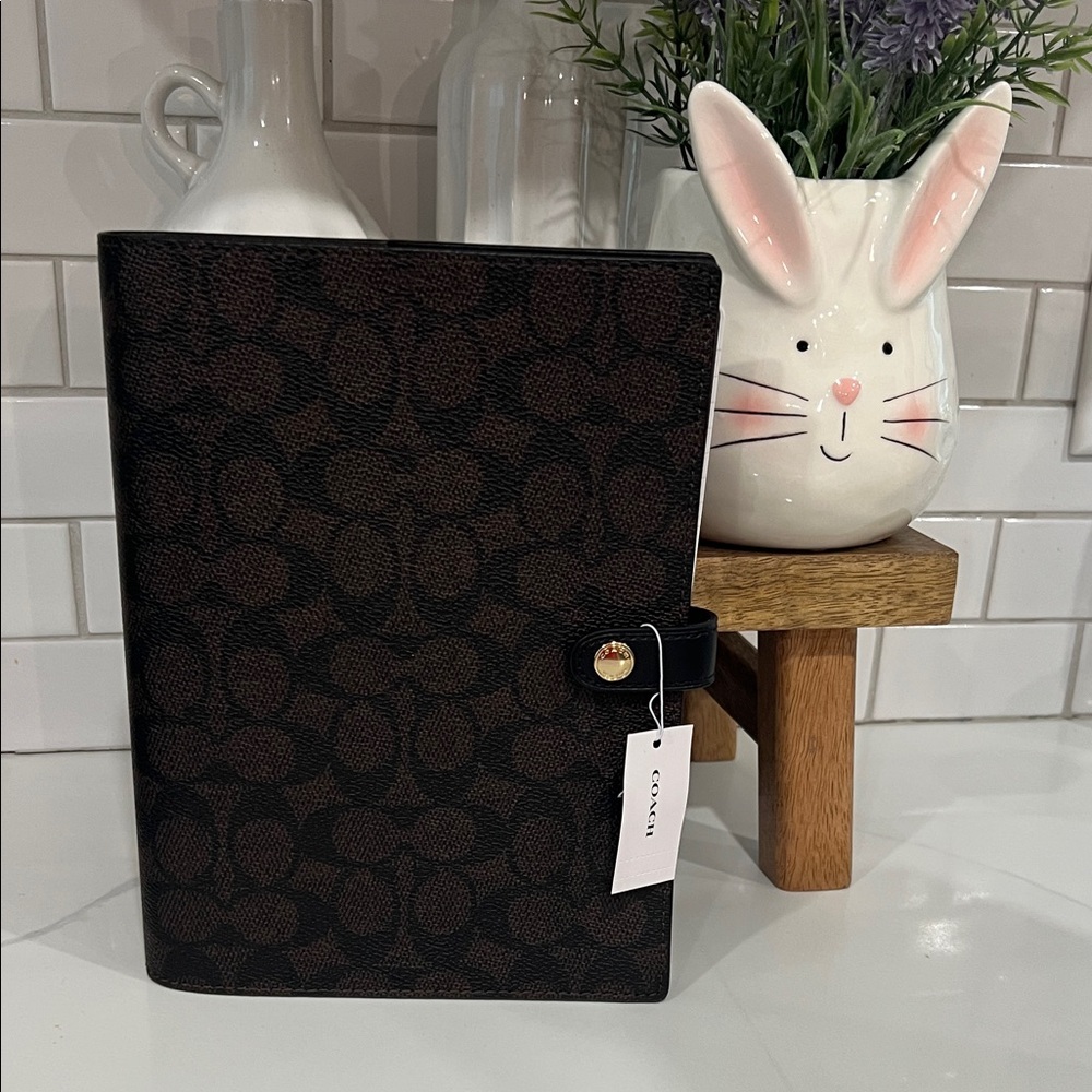 Cute. ✏️COACH NOTEBOOK...